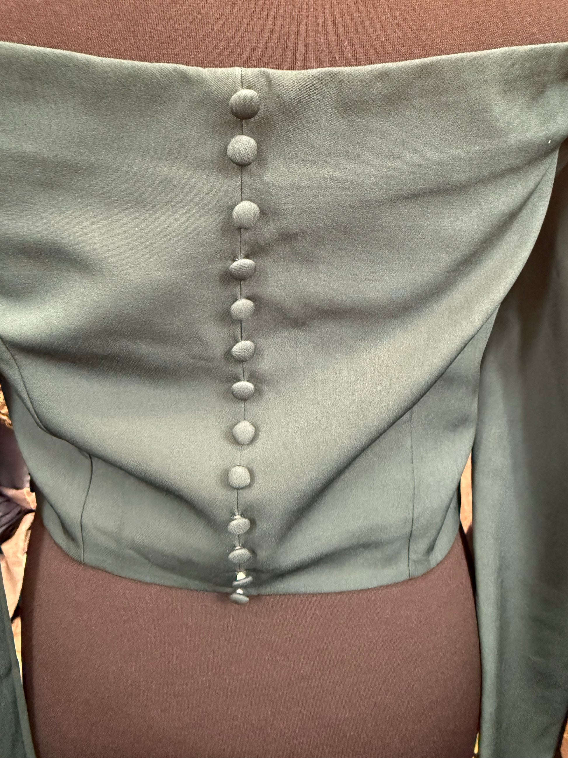 Coast long sleeved off the shoulder button detail top