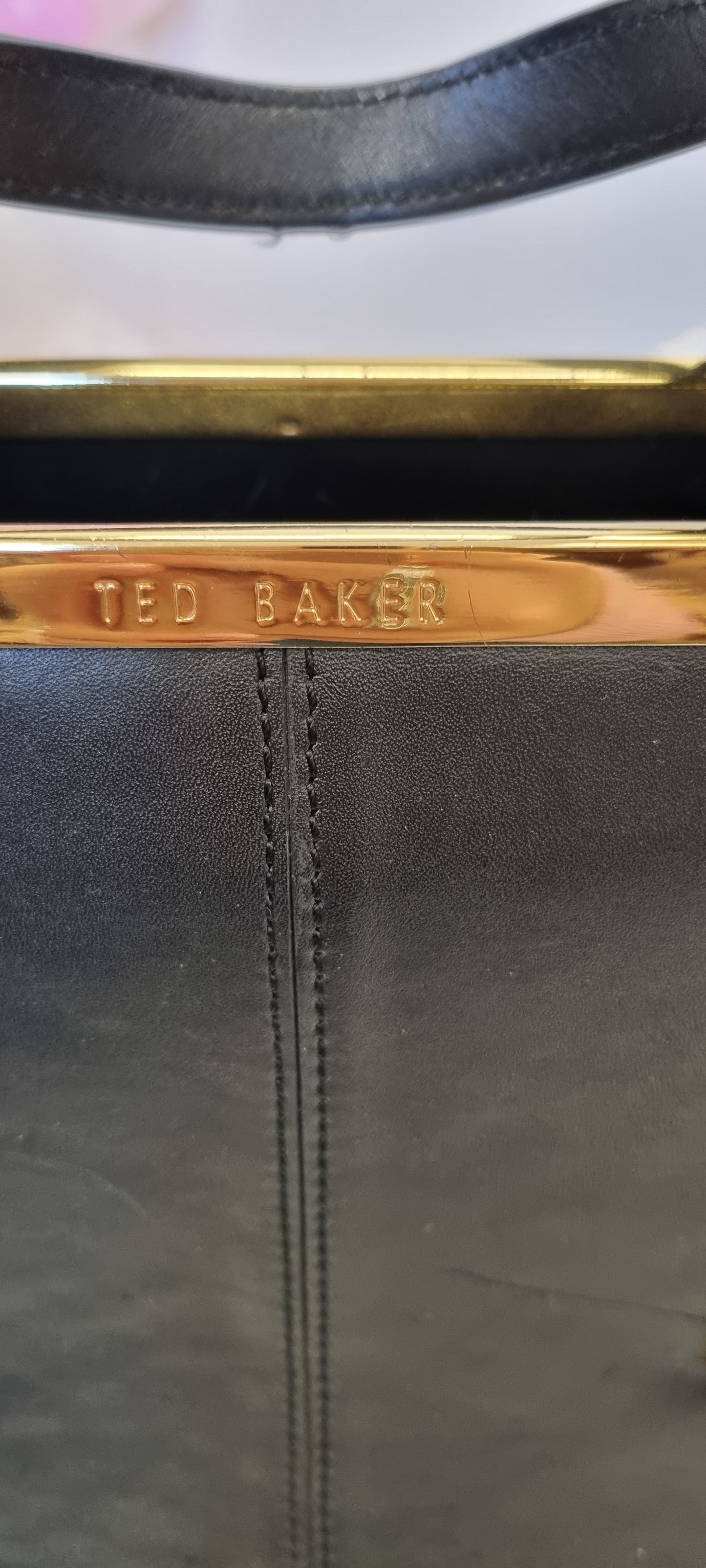 Ted Baker gold and black handbag.