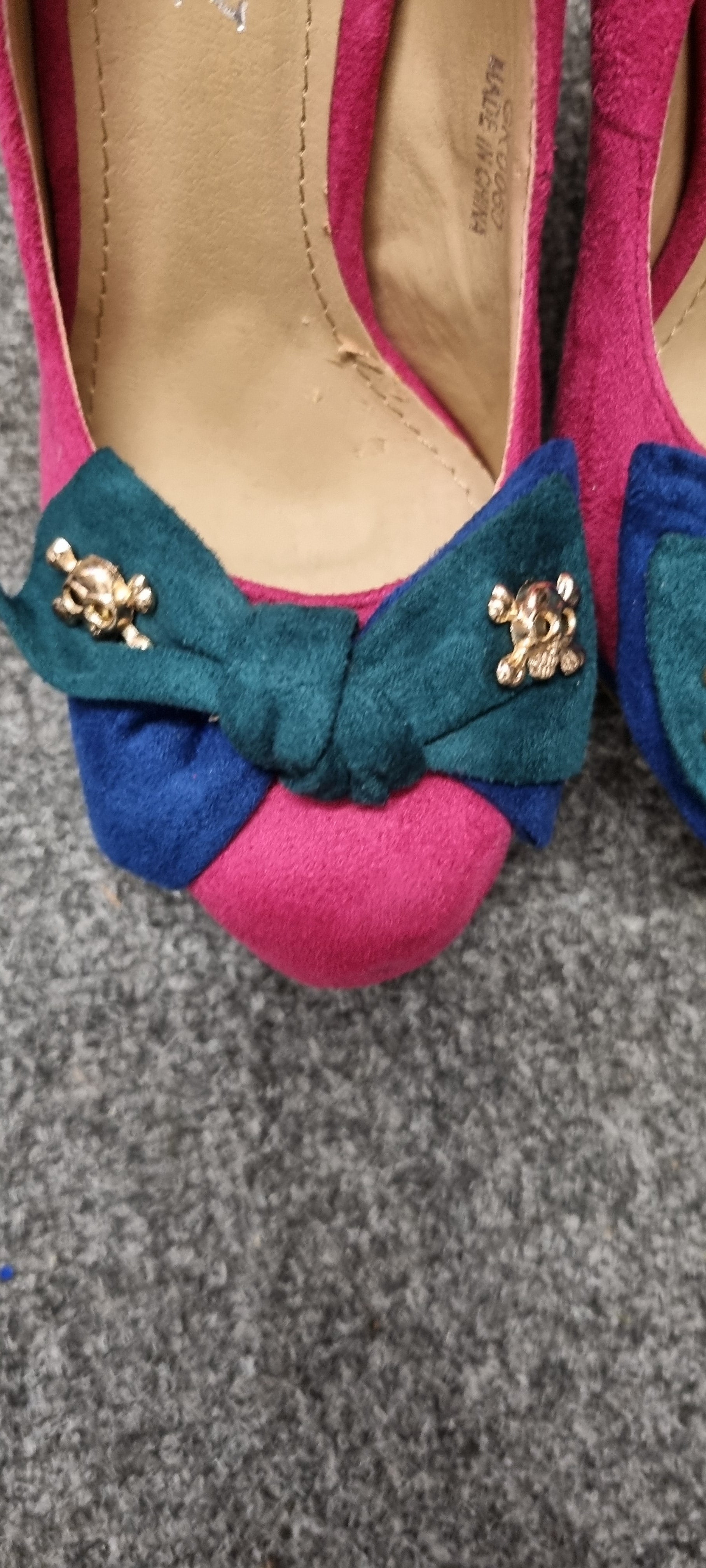 Roxy platform bow skull heels