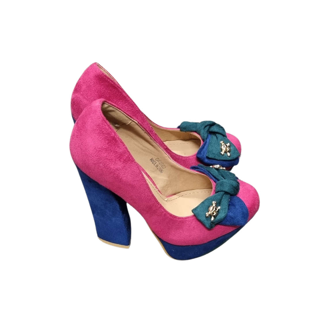 Roxy platform bow skull heels