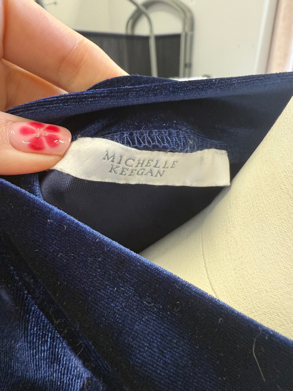 Michelle Keegan navy velor high neck long sleeved dress