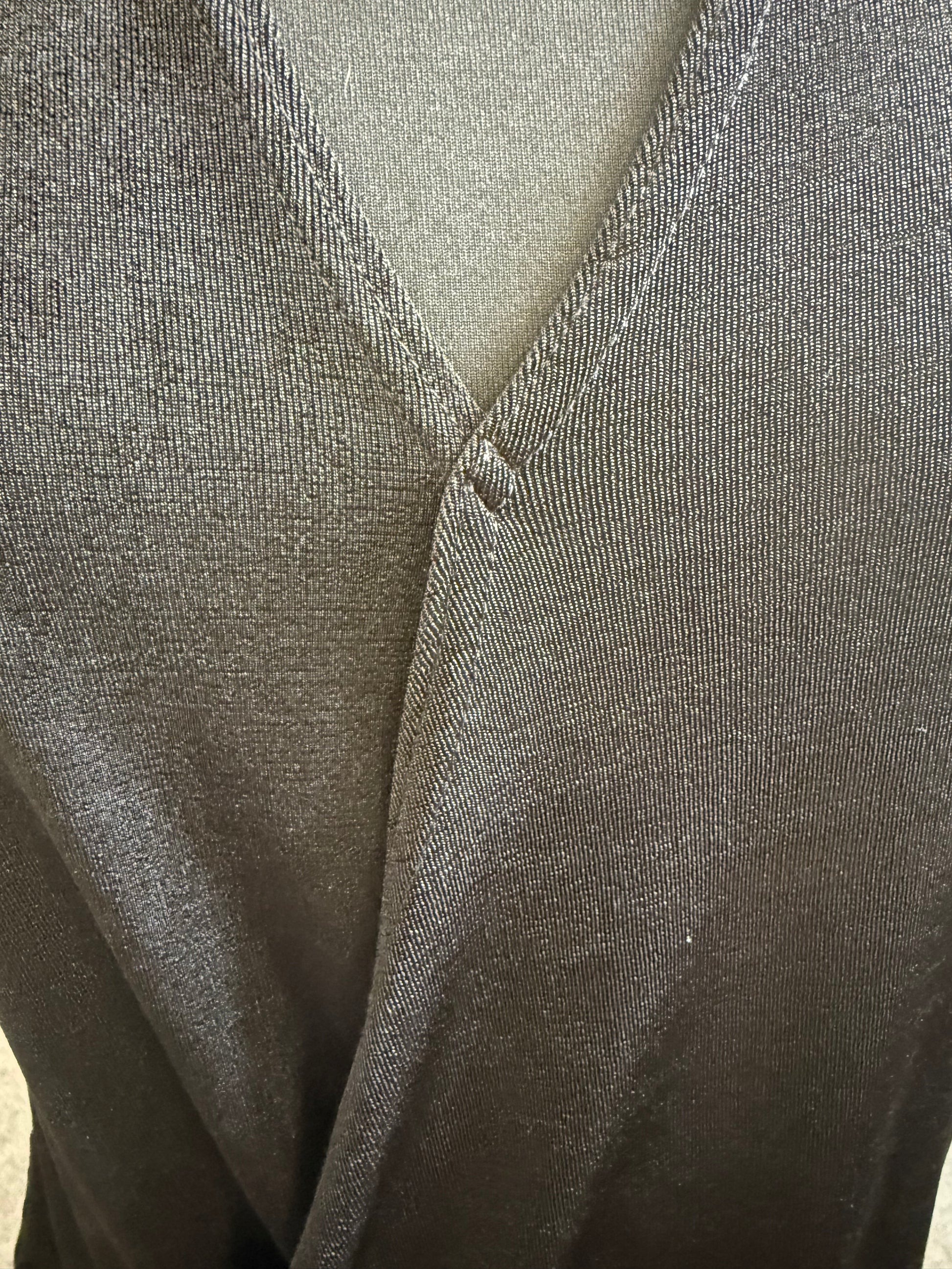 Very black sleeveless high neck top