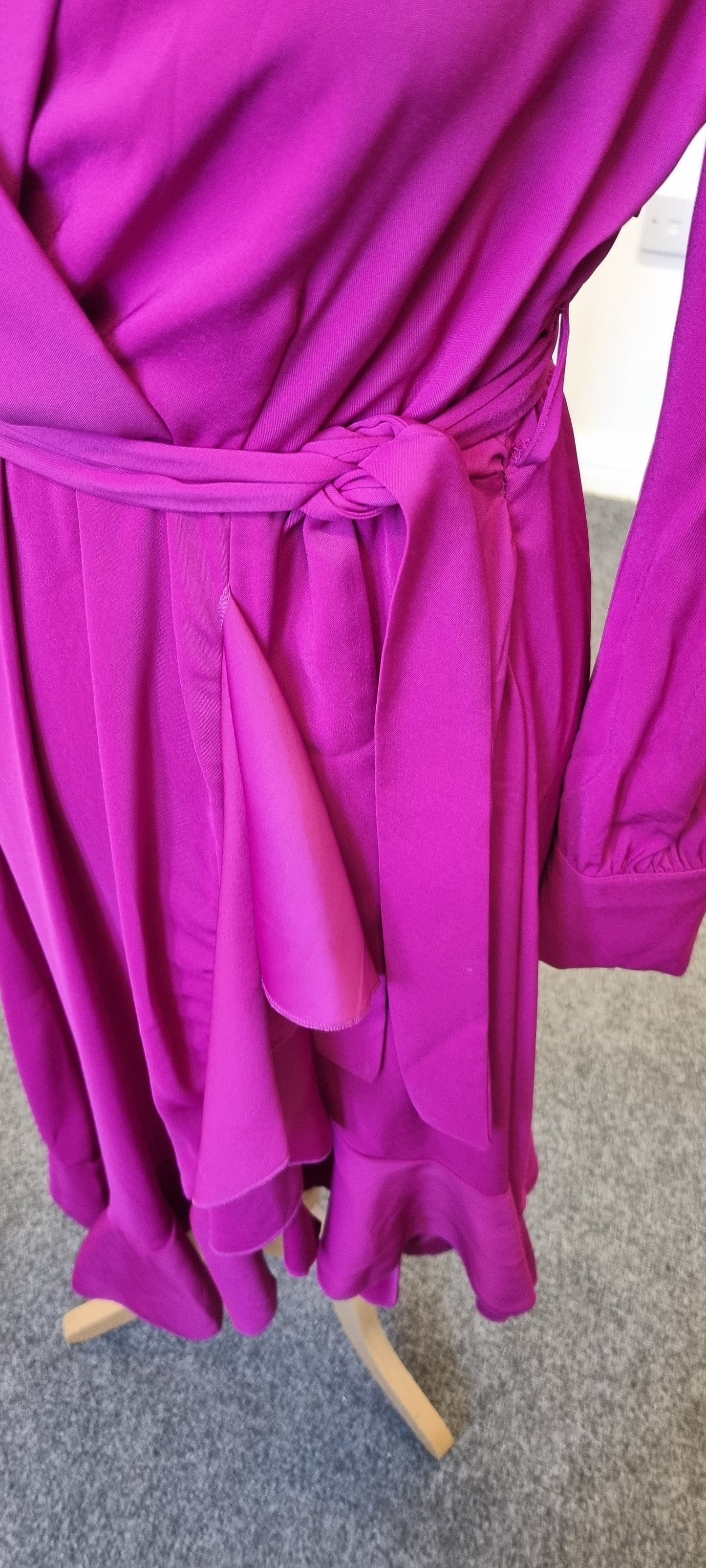 Chique fuschia wrap style long sleeved tie midi dress