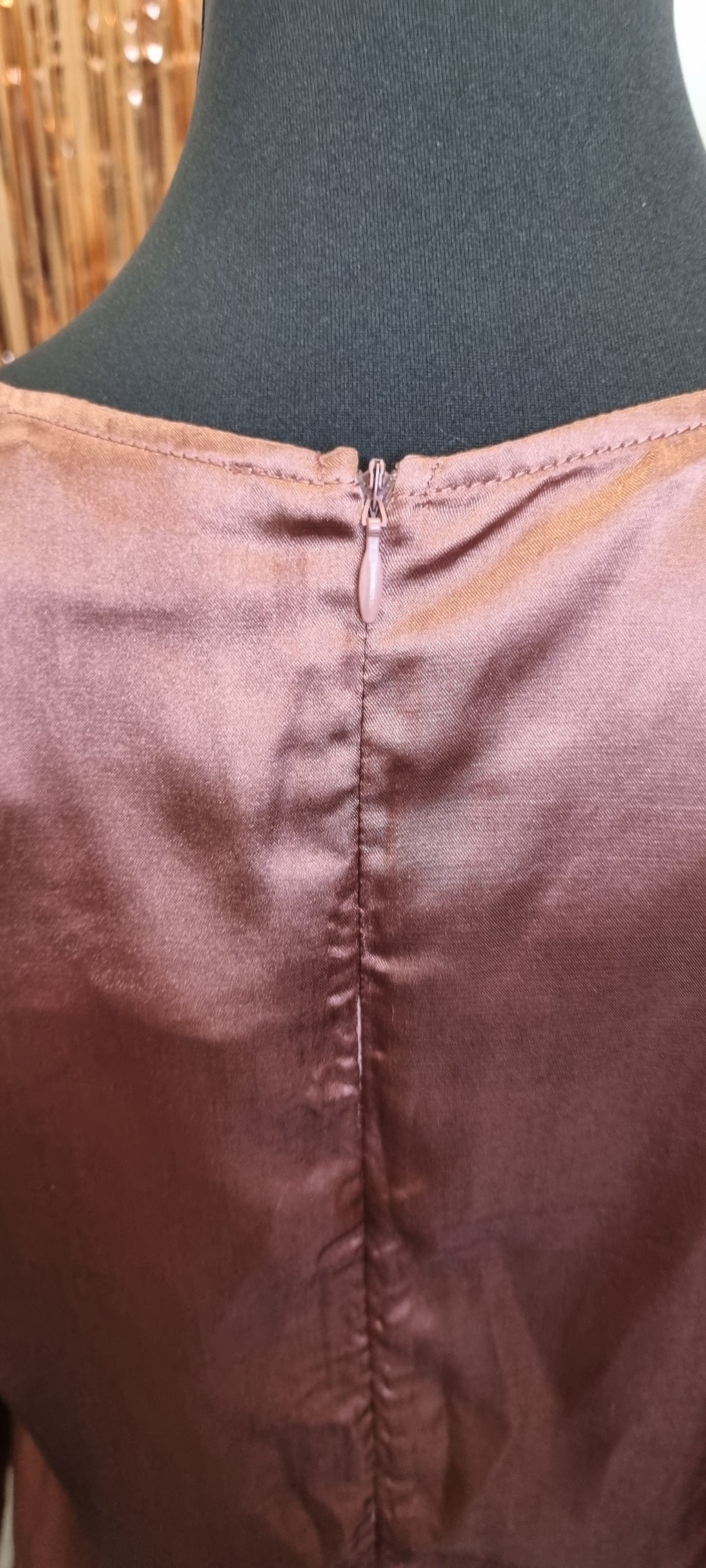 Glamorous long sleeved cross detail bronze mini dress